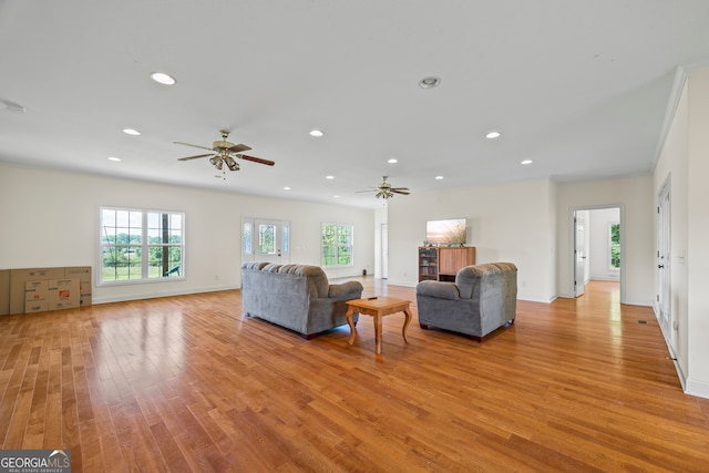 653 Fort Lamar Rd, Commerce, GA 30530 - living room featuring a ceiling fan, light wood finished floors, recessed lighting, and baseboards