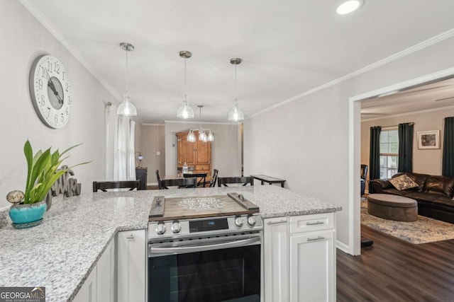 156 Sims St, Winder, GA 30680 - kitchen with stainless steel electric range, crown molding, dark wood-type flooring, white cabinets, and light stone countertops