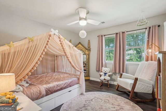 156 Sims St, Winder, GA 30680 - bedroom featuring baseboards, wood finished floors, and ceiling fan