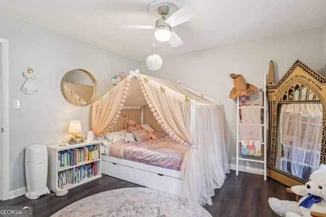 156 Sims St, Winder, GA 30680 - bedroom with wood finished floors and baseboards