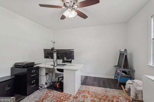 156 Sims St, Winder, GA 30680 - office featuring dark wood finished floors, ceiling fan, and baseboards