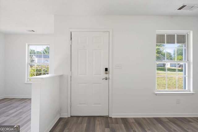 3645 Ten Oaks Cir, Powder Springs, GA 30127 - entrance foyer with wood finished floors and baseboards