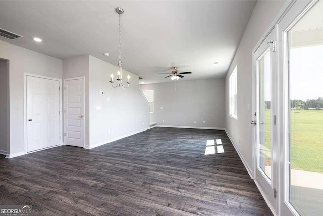 609 Lobelia Way, Locust Grove, GA 30248 - unfurnished living room featuring a chandelier, plenty of natural light, ceiling fan, dark wood-type flooring, and recessed lighting