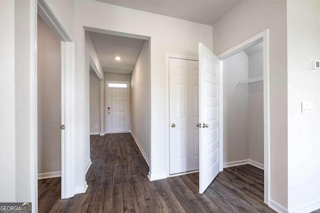 609 Lobelia Way, Locust Grove, GA 30248 - corridor with baseboards and dark wood finished floors