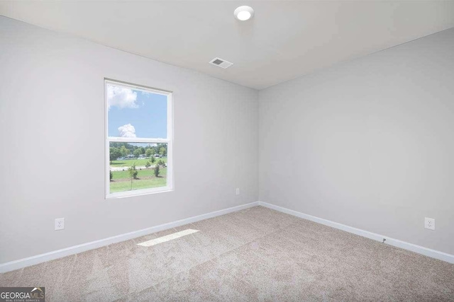 609 Lobelia Way, Locust Grove, GA 30248 - carpeted spare room featuring baseboards