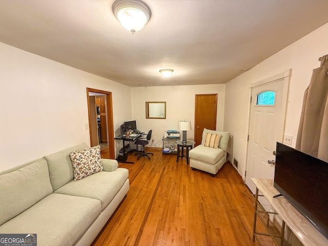5141 Hiram Lithia Springs Rd, Powder Springs, GA 30127 - living area with light wood-style floors and an office area