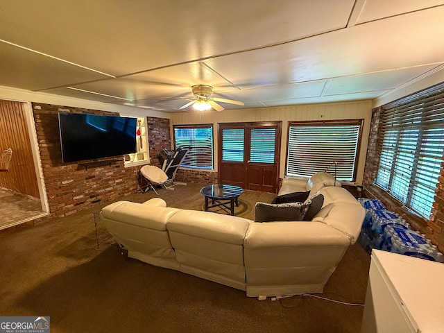 5141 Hiram Lithia Springs Rd, Powder Springs, GA 30127 - living area featuring ceiling fan, wooden walls, and carpet floors