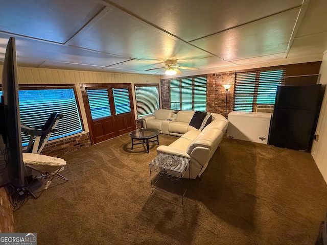 5141 Hiram Lithia Springs Rd, Powder Springs, GA 30127 - living room featuring carpet flooring, a ceiling fan, and wood walls
