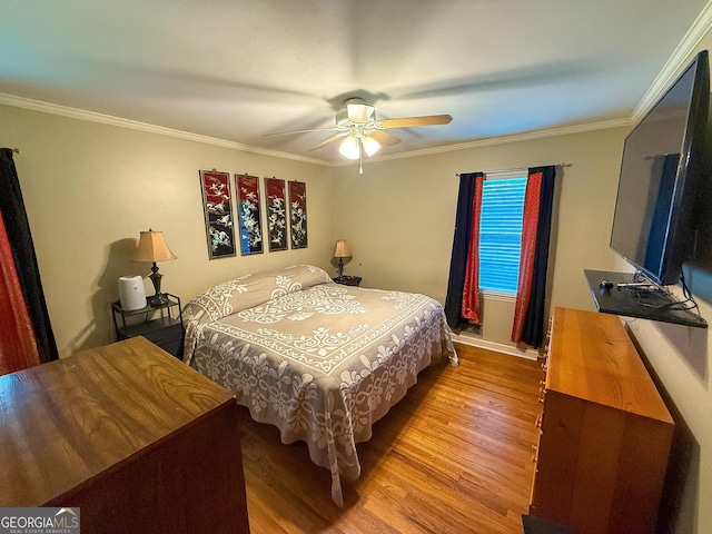 5141 Hiram Lithia Springs Rd, Powder Springs, GA 30127 - bedroom with wood finished floors, crown molding, a ceiling fan, and baseboards