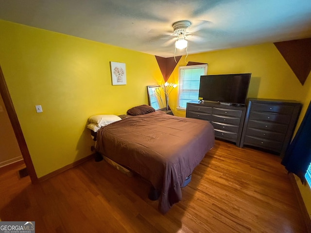 5141 Hiram Lithia Springs Rd, Powder Springs, GA 30127 - bedroom featuring wood finished floors, baseboards, and a ceiling fan