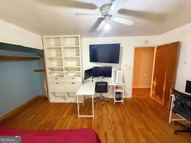 5141 Hiram Lithia Springs Rd, Powder Springs, GA 30127 - bedroom featuring wood finished floors, baseboards, an office area, and ceiling fan