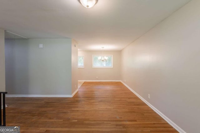 4345 Kimball Rd SW, Atlanta, GA 30331 - empty room featuring a chandelier and wood finished floors