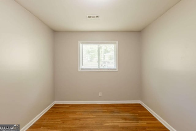 4345 Kimball Rd SW, Atlanta, GA 30331 - empty room with wood finished floors and baseboards