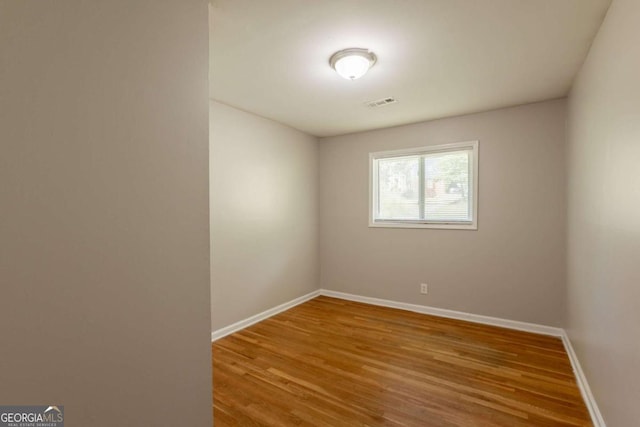4345 Kimball Rd SW, Atlanta, GA 30331 - empty room with wood finished floors and baseboards
