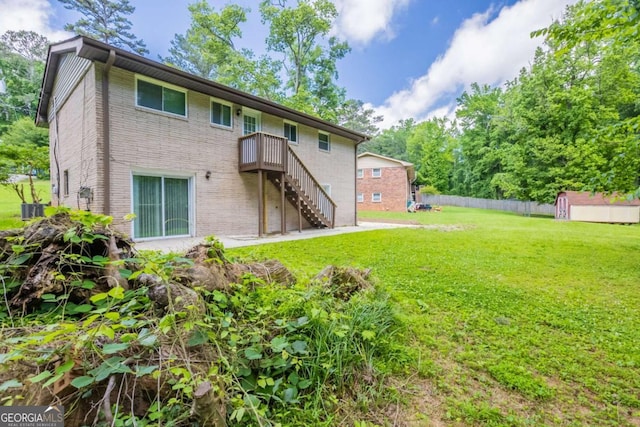 4345 Kimball Rd SW, Atlanta, GA 30331 - back of property featuring brick siding, stairs, and a storage unit