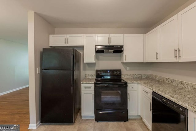 4345 Kimball Rd SW, Atlanta, GA 30331 - kitchen featuring black appliances, ventilation hood, and white cabinets