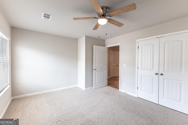 162 Cool Creek Ct, Dallas, GA 30132 - unfurnished bedroom featuring carpet floors, baseboards, a closet, and ceiling fan