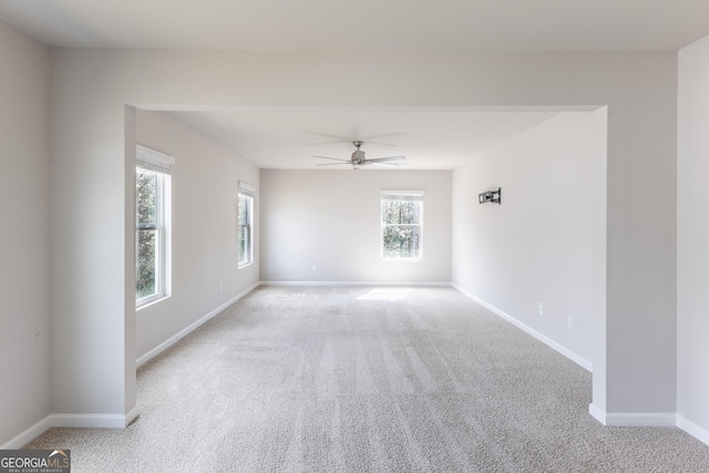 162 Cool Creek Ct, Dallas, GA 30132 - empty room featuring light colored carpet, a ceiling fan, and baseboards