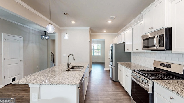 162 Cool Creek Ct, Dallas, GA 30132 - kitchen featuring appliances with stainless steel finishes, a sink, a center island with sink, dark wood-style flooring, and white cabinets