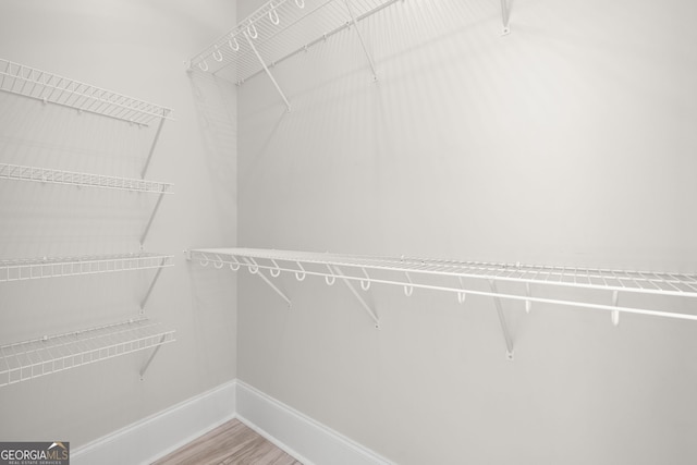 401 Roper Dr, Clarkesville, GA 30523 - walk in closet featuring wood finished floors