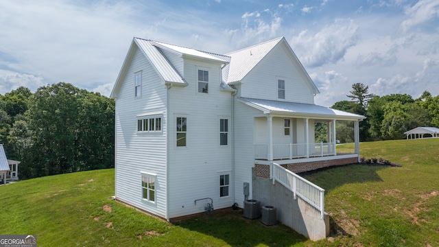 401 Roper Dr, Clarkesville, GA 30523 - back of house with a porch, a lawn, metal roof, and central AC unit
