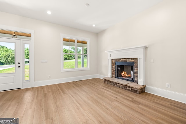 401 Roper Dr, Clarkesville, GA 30523 - unfurnished living room featuring wood finished floors, baseboards, a fireplace, and recessed lighting