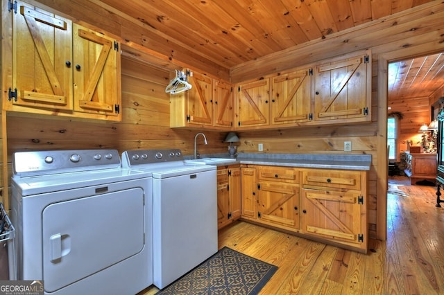 270 Stone Ln, Blue Ridge, GA 30513 - laundry room featuring cabinet space, washing machine and dryer, wood ceiling, wooden walls, and light wood-style flooring