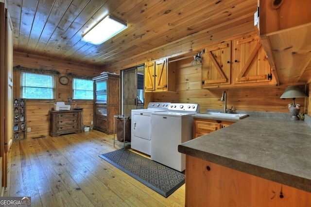270 Stone Ln, Blue Ridge, GA 30513 - laundry room with cabinet space, washing machine and clothes dryer, light wood-style floors, wood walls, and wood ceiling