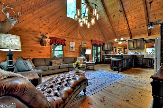 270 Stone Ln, Blue Ridge, GA 30513 - living room featuring a chandelier, high vaulted ceiling, light wood finished floors, wooden walls, and wooden ceiling with exposed beams