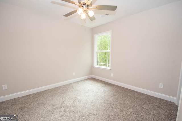 628 Grove St, Barnesville, GA 30204 - carpeted empty room featuring baseboards and ceiling fan
