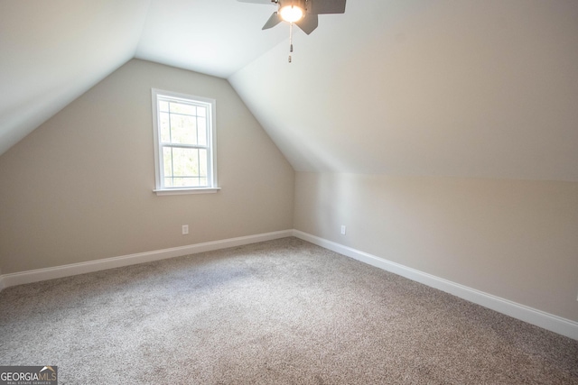 628 Grove St, Barnesville, GA 30204 - additional living space featuring ceiling fan, baseboards, carpet floors, and vaulted ceiling