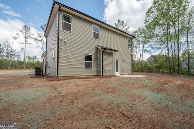 628 Grove St, Barnesville, GA 30204 - back of house featuring central air condition unit