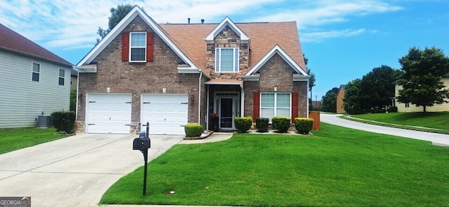7314 Basalt Dr, Union City, GA 30291 - view of front of house featuring driveway, stone siding, a front yard, a garage, and brick siding