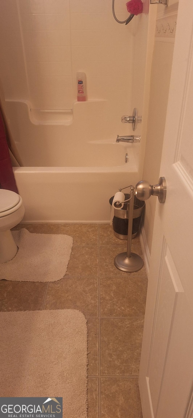 7314 Basalt Dr, Union City, GA 30291 - bathroom with shower / tub combination and tile patterned floors
