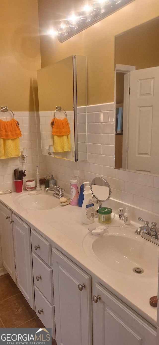 7314 Basalt Dr, Union City, GA 30291 - bathroom featuring double vanity, backsplash, and tile patterned floors