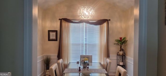 7314 Basalt Dr, Union City, GA 30291 - dining room with a chandelier, a decorative wall, and a wainscoted wall