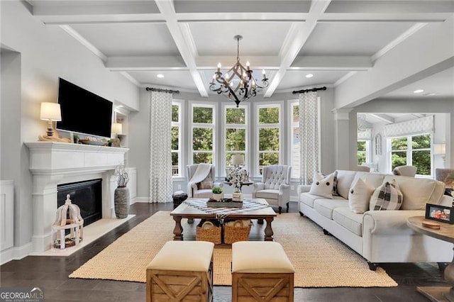 3330 Riverwalk Way, Cumming, GA 30040 - living room with a chandelier, beamed ceiling, a fireplace with flush hearth, wood finished floors, and recessed lighting