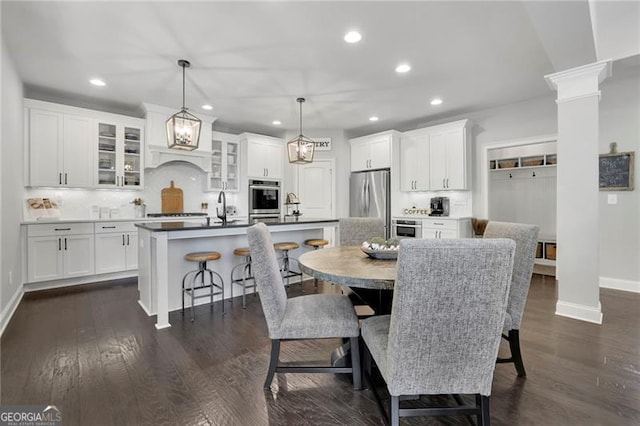 3330 Riverwalk Way, Cumming, GA 30040 - dining space featuring recessed lighting, baseboards, and dark wood-style floors