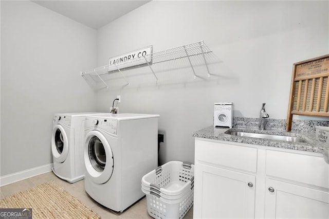 3330 Riverwalk Way, Cumming, GA 30040 - washroom with washing machine and dryer, cabinet space, and light tile patterned flooring