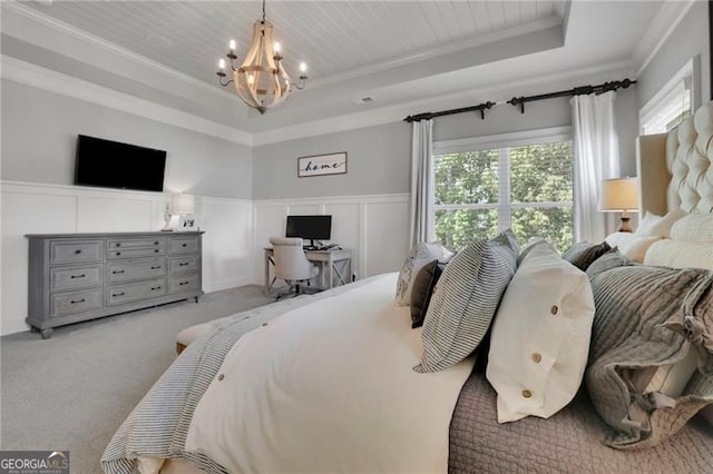 3330 Riverwalk Way, Cumming, GA 30040 - bedroom featuring a tray ceiling, a chandelier, crown molding, light carpet, and an office area