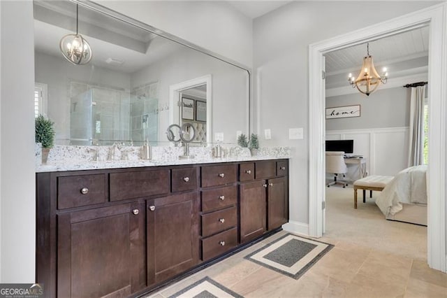 3330 Riverwalk Way, Cumming, GA 30040 - ensuite bathroom featuring a chandelier, double vanity, and a stall shower