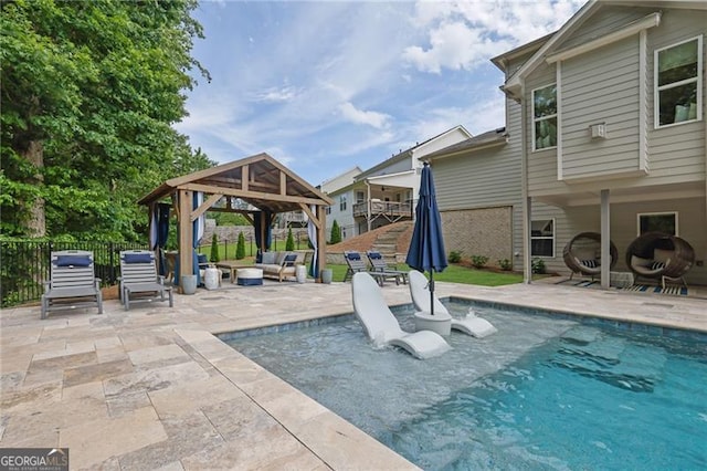 3330 Riverwalk Way, Cumming, GA 30040 - view of pool featuring a gazebo, a patio area, and an outdoor hangout area
