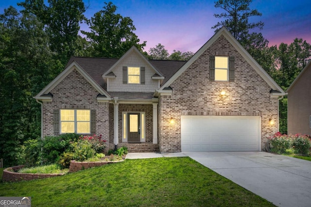 350 Paces Dr, Lithia Springs, GA 30122 - view of front facade with concrete driveway, a front lawn, and brick siding