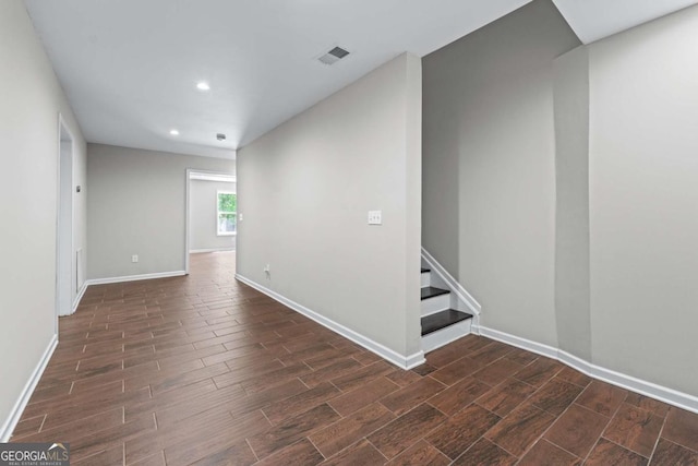 350 Paces Dr, Lithia Springs, GA 30122 - unfurnished room with wood tiled floors, recessed lighting, baseboards, and stairs