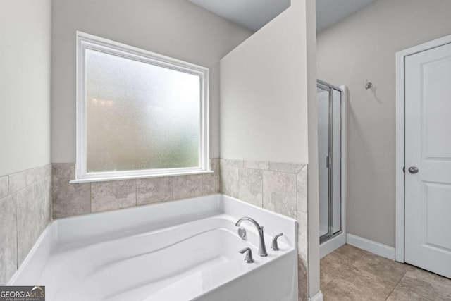 350 Paces Dr, Lithia Springs, GA 30122 - full bathroom with a garden tub and a shower stall