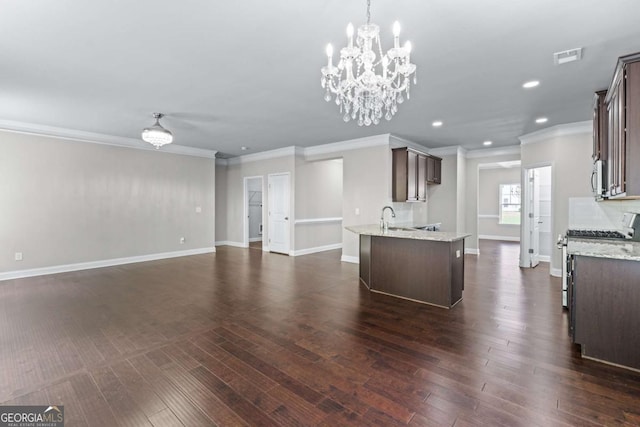 350 Paces Dr, Lithia Springs, GA 30122 - kitchen featuring stainless steel appliances, crown molding, dark brown cabinets, a sink, and recessed lighting