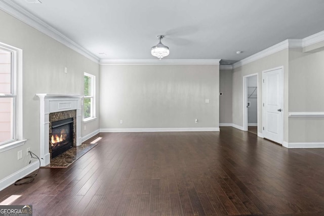 350 Paces Dr, Lithia Springs, GA 30122 - unfurnished living room with a premium fireplace, dark wood finished floors, ornamental molding, and baseboards