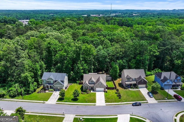 350 Paces Dr, Lithia Springs, GA 30122 - aerial perspective of suburban area featuring a heavily wooded area