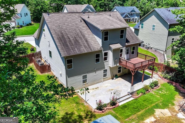 350 Paces Dr, Lithia Springs, GA 30122 - rear view of house with a patio area, a wooden deck, and a shingled roof