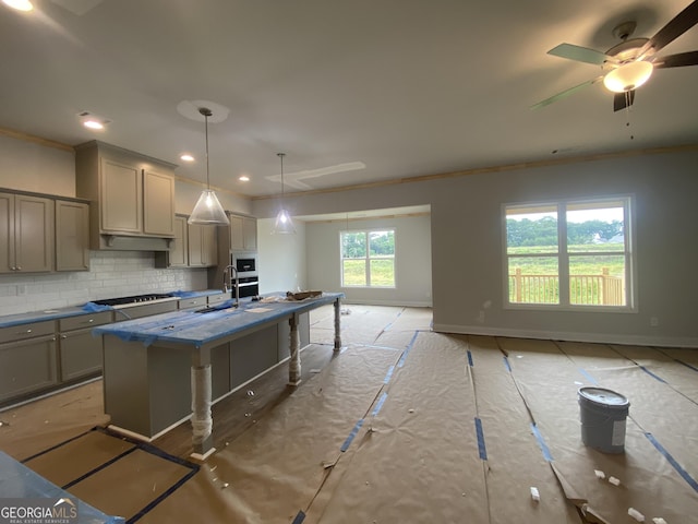 179 Merwood Ln Unit 125, Jefferson, GA 30549 - kitchen with gray cabinetry, black stovetop, decorative backsplash, a ceiling fan, and ornamental molding